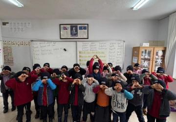 Adıyaman'ın İnlice beldesinde öğrencilere kışlık bot ve mont desteği